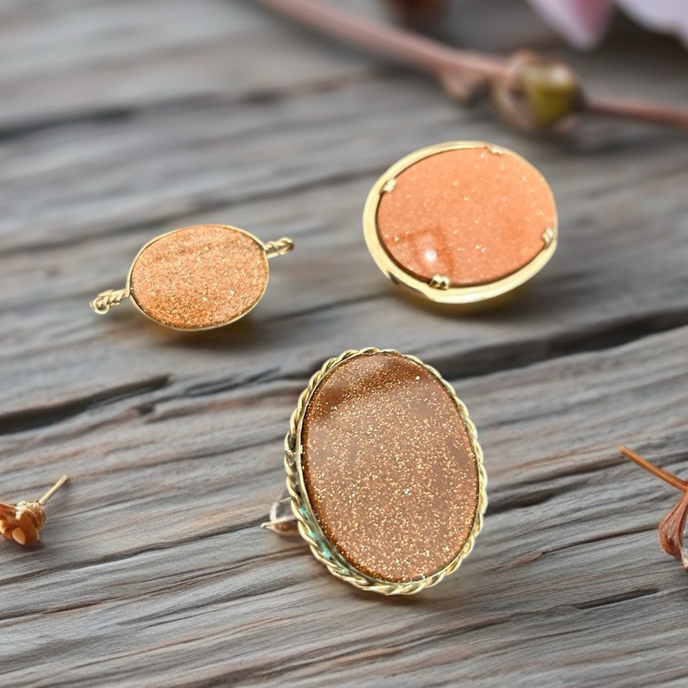 Three Vintage Sunstone and Brass Brooches.